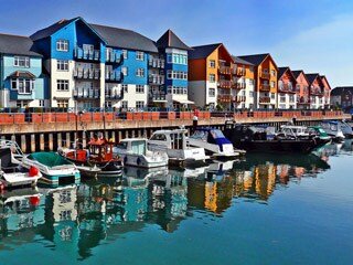 Harbour Master At The Helm at Exmouth Marina